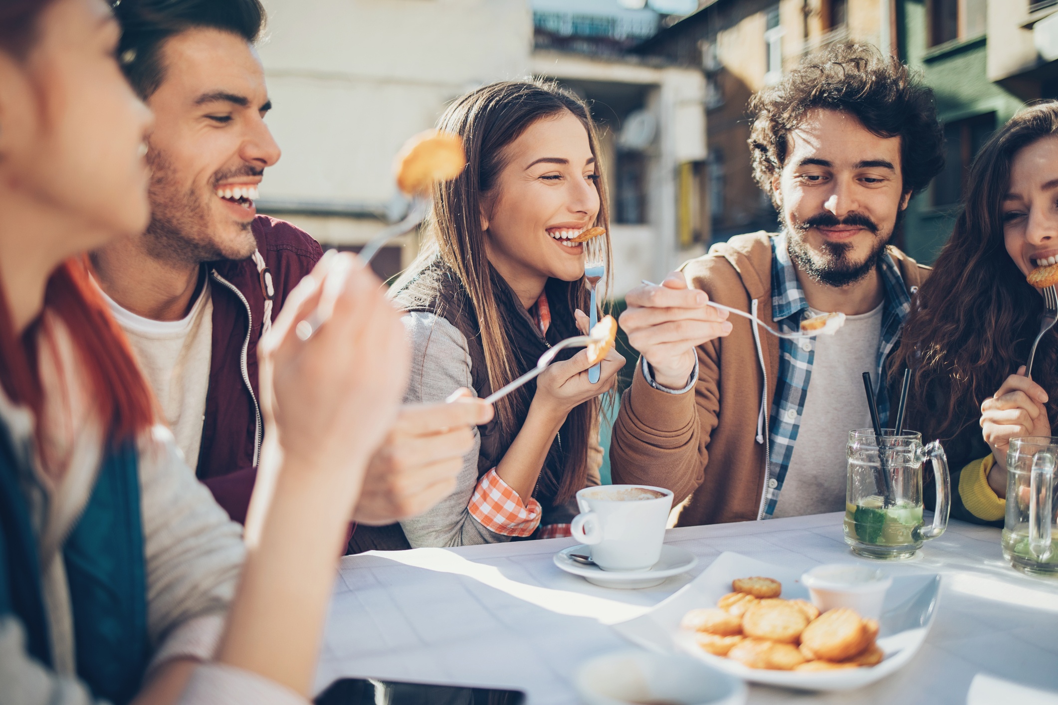 Friends outside having brunch together